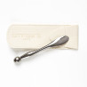 Photo of the Omnisens Paris double-ended eye tool with its storage pouch to reduce dark circles and firm skin.