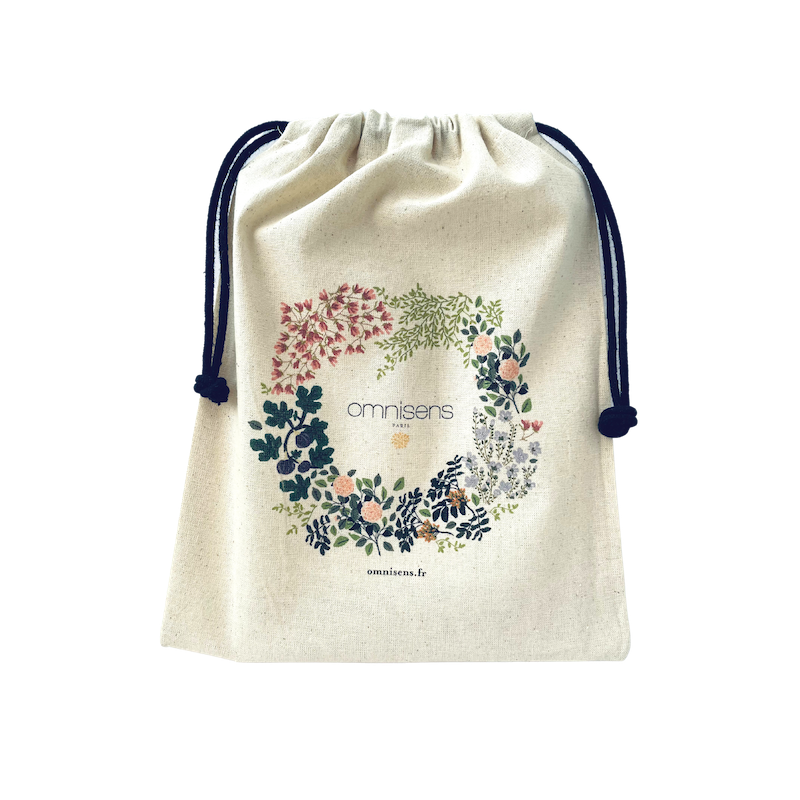 Offrez vos cadeaux dans cette pochette en coton Oeko-tex, reprenant l'Univers floral d'Omnisens.